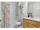 Cozy bathroom featuring a tub/shower combination with modern fixtures and stylish decor at 10254 Beechwood Ln, Orlando, FL 32832