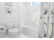 Charming bathroom featuring a tub with mermaid-themed shower curtains and playful decor, creating a whimsical space at 10254 Beechwood Ln, Orlando, FL 32832