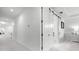 Hallway featuring sliding barn doors leading to another room, seamlessly integrating functionality with aesthetic appeal at 10254 Beechwood Ln, Orlando, FL 32832