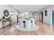 Open-concept kitchen and dining area with modern appliances and ample natural light at 10254 Beechwood Ln, Orlando, FL 32832