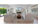 Cozy living room features a modern fireplace, comfortable seating, and sliding doors to the backyard at 10254 Beechwood Ln, Orlando, FL 32832