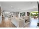 Spacious open-concept home with bright living area, modern kitchen and seamless indoor-outdoor transition at 10254 Beechwood Ln, Orlando, FL 32832