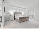 Bright main bedroom with tray ceiling, plush carpet, and French doors leading to a balcony at 10254 Beechwood Ln, Orlando, FL 32832
