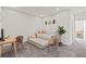 Bedroom featuring a daybed with trundle, desk area, and neutral decor for a versatile space at 17407 Hidden Forest Dr, Clermont, FL 34714