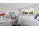 Bright primary bedroom featuring calming colors, closet and a television at 17407 Hidden Forest Dr, Clermont, FL 34714