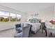 Comfortable bedroom with a large window, stylish bed, and charming decor at 17407 Hidden Forest Dr, Clermont, FL 34714