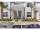 Charming townhome with manicured landscaping, featuring dual entrances and a modern stone facade at 17407 Hidden Forest Dr, Clermont, FL 34714