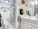 This elegant bathroom features a glass-enclosed shower, a vanity, and stylish fixtures at 200 Maitland Ave # 87, Altamonte Springs, FL 32701