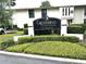 Welcoming Capistrano Condominiums community sign with manicured landscaping and attractive building facade at 200 Maitland Ave # 87, Altamonte Springs, FL 32701