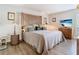 This spacious main bedroom features a decorative headboard, stylish lamps, and sleek flooring at 200 Maitland Ave # 87, Altamonte Springs, FL 32701