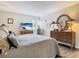 Cozy main bedroom boasting a large window, sleek floors, and modern decor for a serene retreat at 200 Maitland Ave # 87, Altamonte Springs, FL 32701