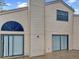 The rear exterior shows neutral siding and sliding glass doors at 2832 Risser Ave, Orlando, FL 32812