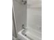 Clean bathroom with a white tiled shower and updated fixtures at 2832 Risser Ave, Orlando, FL 32812