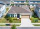 Aerial view of the home showcasing its well-maintained yard and neighborhood surroundings at 4012 Meandering Bay Dr, Apopka, FL 32712