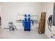 Water filtration system and electric car charger in garage at 4012 Meandering Bay Dr, Apopka, FL 32712