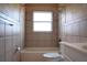 Bathroom with tiled shower and neutral finishes at 479 Little Aspen Ct, Ocoee, FL 34761