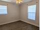Bedroom with laminate flooring, natural light, and ceiling fan at 479 Little Aspen Ct, Ocoee, FL 34761