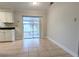 Bright kitchen nook area featuring sliding glass doors, easy access to the outdoor screened patio at 479 Little Aspen Ct, Ocoee, FL 34761