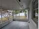 Enclosed screened in porch overlooks the backyard, a wonderful outdoor space for relaxation and entertainment at 479 Little Aspen Ct, Ocoee, FL 34761