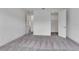 Bright bedroom featuring neutral paint, plush carpeting and a walk-in closet at 10013 Brocksport Cir, Gotha, FL 34734