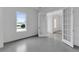Well-lit bedroom with glass french doors, neutral tones, and tile flooring, ideal for a minimalist design at 10013 Brocksport Cir, Gotha, FL 34734