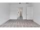 Cozy carpeted bedroom leading to bathroom, featuring a clean and simple design at 10013 Brocksport Cir, Gotha, FL 34734
