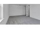 Bright bedroom featuring neutral paint, plush carpeting and two doorways at 10013 Brocksport Cir, Gotha, FL 34734
