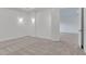 Spacious bedroom with neutral carpet and an open doorway at 10013 Brocksport Cir, Gotha, FL 34734