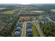 Aerial view of the property nestled within a vibrant community and surrounded by nature at 1062 Lakeside Estates Dr, Apopka, FL 32703