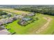 Community featuring a sparkling pool, playground, and lush green spaces at 1062 Lakeside Estates Dr, Apopka, FL 32703