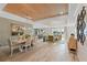 Open-concept dining area with modern lighting and seamless flow to the living space at 1062 Lakeside Estates Dr, Apopka, FL 32703
