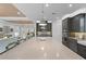 The kitchen is designed with modern stainless steel appliances and offers a convenient layout to the living area at 1062 Lakeside Estates Dr, Apopka, FL 32703