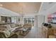 Comfortable living room with a wood-paneled ceiling and lots of natural light at 1062 Lakeside Estates Dr, Apopka, FL 32703