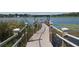 View looking out to community lake from the pier at 1062 Lakeside Estates Dr, Apopka, FL 32703