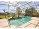 Sparkling pool with spa, offering a relaxing and luxurious outdoor experience with lovely water views at 10664 Emerald Chase Dr, Orlando, FL 32836