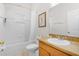 Clean bathroom with bathtub and shower combo, featuring a vanity with good lighting at 107 Rum Run # 107, Davenport, FL 33897