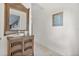 Inviting foyer with tiled floors, decorative mirror, and stylish furnishings at 107 Rum Run # 107, Davenport, FL 33897
