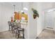 Cozy kitchen showcasing a breakfast bar with seating, perfect for casual dining at 107 Rum Run # 107, Davenport, FL 33897