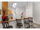 Kitchen featuring a breakfast bar with seating, bright lighting, and modern appliances at 107 Rum Run # 107, Davenport, FL 33897