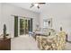 Bright and airy living room with balcony access and comfortable seating at 107 Rum Run # 107, Davenport, FL 33897