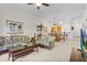 Open-concept living area flows into the dining and kitchen, perfect for entertaining at 107 Rum Run # 107, Davenport, FL 33897