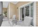 Relaxing patio area with comfortable seating, ideal for outdoor leisure at 107 Rum Run # 107, Davenport, FL 33897