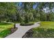 Beautifully landscaped walkways surround a charming condo community at 107 Rum Run # 107, Davenport, FL 33897