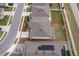 Aerial view of property with defined lot lines, showcasing the home's position and surrounding neighborhood at 1092 Sugarwood St, Davenport, FL 33837