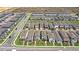 An aerial view showcases a well-planned neighborhood with modern homes and landscaped streets at 12067 Eastmoor Dr, Winter Garden, FL 34787