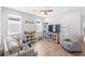 Bright living room with furniture, ceiling fan, and abundance of natural light at 12067 Eastmoor Dr, Winter Garden, FL 34787