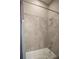 Cozy bathroom featuring a shower-tub combo with tiled walls and a shower curtain at 12334 Upper Harden Ave, Orlando, FL 32827