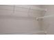 Bright walk-in closet with multiple wire shelves for optimal storage and organization at 12334 Upper Harden Ave, Orlando, FL 32827