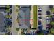An aerial view shows the property outlined in red with parking, landscaping, and surrounding buildings at 12955 Cats Claw Ln, Orlando, FL 32828