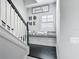 Welcoming hallway with a built-in bench, decorative pillows, and a charming 